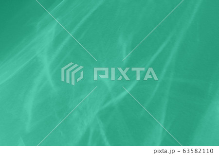 mint colored abstract background with light and 63582110