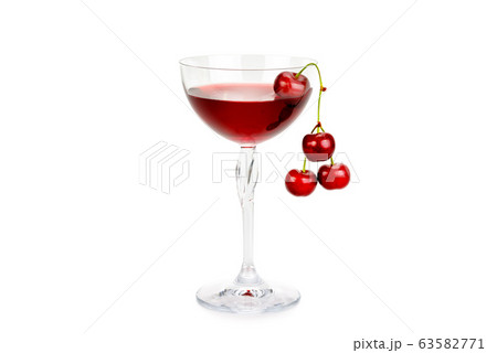 Cherry juice and berries isolated on white 63582771