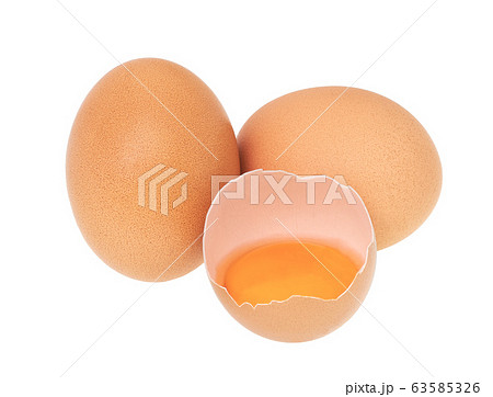 Broken eggs isolated on white background Broken eggs isolated on white background 63585326