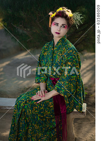 Beautiful woman in Geisha kimono 63586009