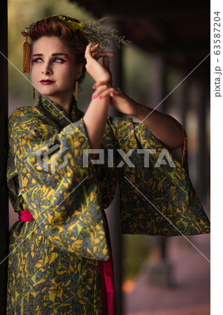 Beautiful woman in Geisha kimono Beautiful woman in Geisha kimono 63587204