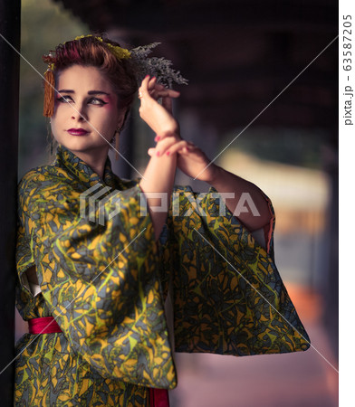 Beautiful woman in Geisha kimono Beautiful woman in Geisha kimono 63587205