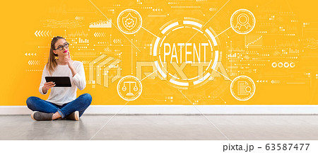 Patent concept with woman using a tablet Patent concept with woman using a tablet 63587477