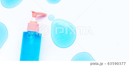 Alcohol hand sanitizer gel in pump bottle on white 63590377