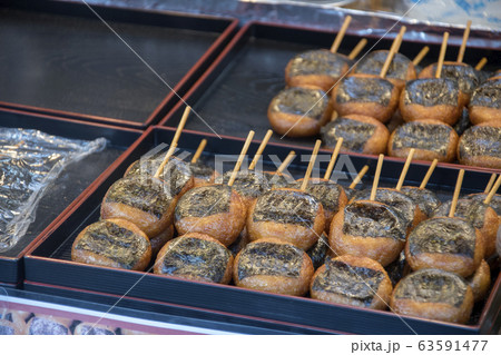 Traditional japanese grilled rice balls with 63591477