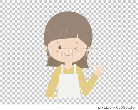 一個女人穿著圍裙擺好 63596130