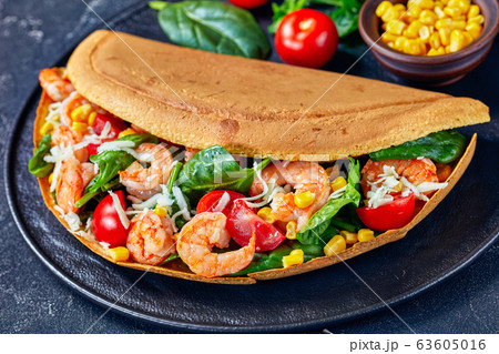 Singapore thick pancake with shrimps fresh spinach Singapore thick pancake with shrimps fresh spinach 63605016
