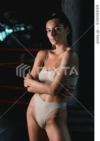 Fashionable brunette girl in a biege underwear Fashionable brunette girl in a biege underwear 63606699