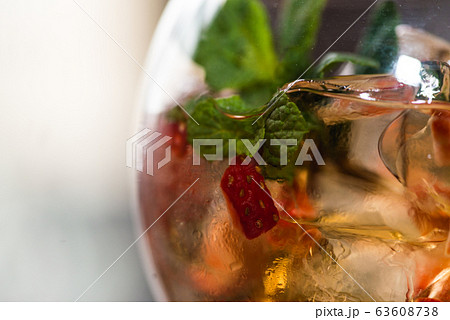 refreshing coctail with strawberries isolated on a refreshing coctail with strawberries isolated on a 63608738