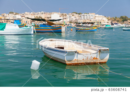 Fishing boat is moored in Marsaxlokk, Malta Fishing boat is moored in Marsaxlokk, Malta 63608741