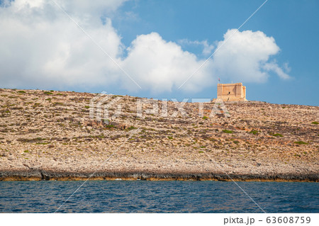 Saint Mary Tower under cloudy sky in summer, Malta 63608759