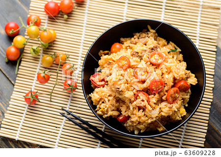 Fried rice with minced pork and tomato in a bowl, Asian food, Top view Fried rice with minced pork and tomato in a bowl, Asian food, Top view 63609228