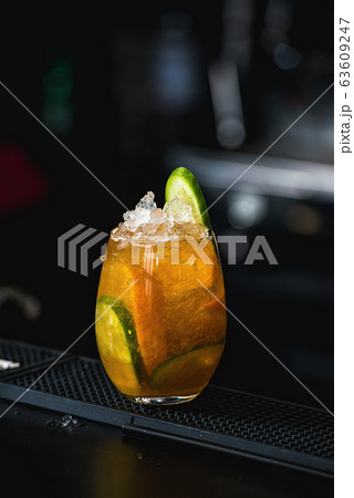 orange margareta fresh Cocktail on a table in bar 63609247