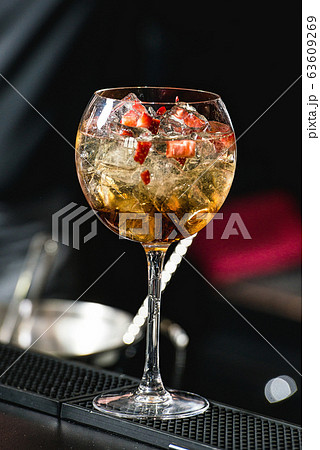 refreshing coctail with strawberries isolated on a refreshing coctail with strawberries isolated on a 63609269