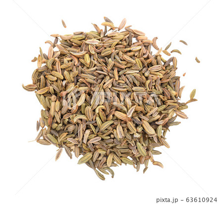 Pile of cumin seeds isolated on white background 63610924