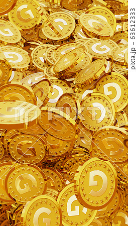 Gの文字 ゴールドの頭文字 が刻印されたたくさんの金貨の写真素材