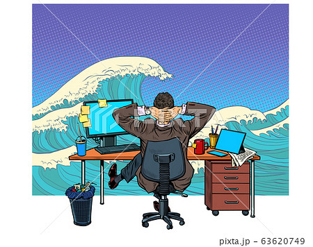 A businessman in the office dreams of the sea 63620749