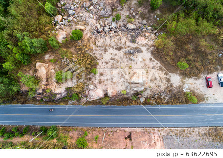 Aerial photo from flying drone of asphalt road. Aerial photo from flying drone of asphalt road. 63622695
