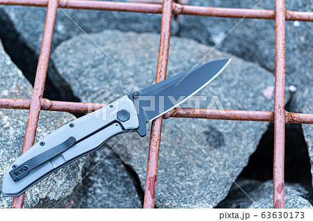 Pocket knife. Knife on the cage. Top. Pocket knife. Knife on the cage. Top. 63630173