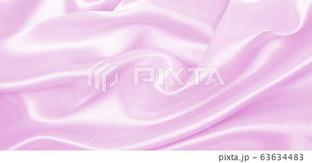 Smooth elegant pink silk or satin texture as 63634483