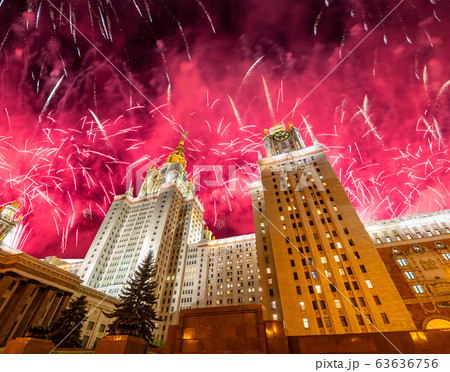 Fireworks over the Lomonosov Moscow State University on Sparrow Hills (at night), main building, Russia. 63636756