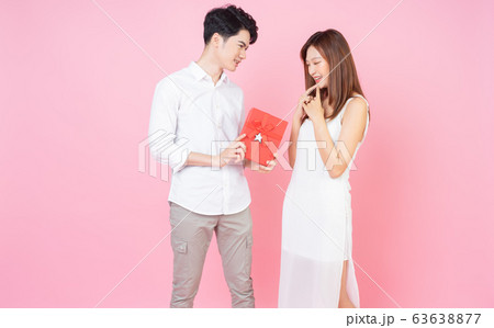 couple with pink background 63638877