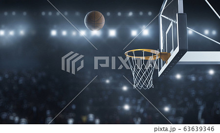 3d render Basketball hit the basket in slow motion on the background of flashes of cameras 63639346