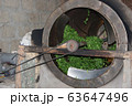 Tea Farmer In The Process Of Making Green Tea 63647496