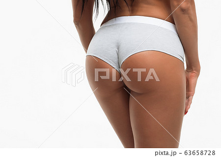 Unrecognizable sensual female model in underwear 63658728