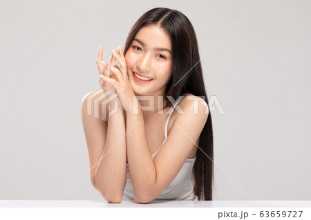 Beautiful Young Asian Woman smile feeling so happy and cheerful with healthy Clean and Fresh skin 63659727