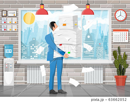 Businessman in pile of office papers 63662052