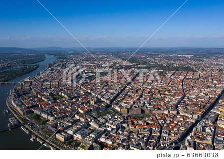 Beautiful view of the old city of Budapest from a height, shot on a drone. In the middle of the Danube river and chain bridge. Panarama with old building.  63663038