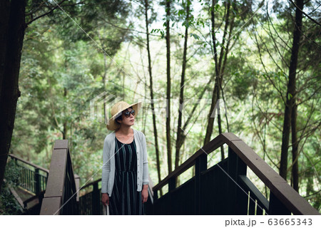 woman walking at the stairs in the outdoor woman walking at the stairs in the outdoor 63665343