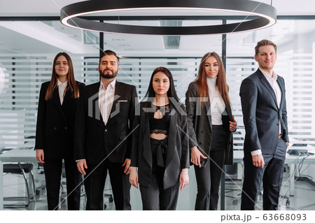 Smiling group portrait of corporate business colleagues 63668093