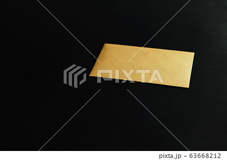 Blank golden paper card on black background, business and luxury brand identity mockup 63668212