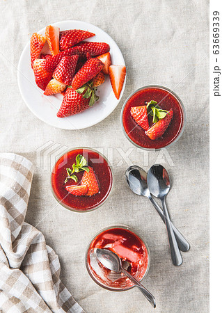 Italian dessert panna cotta with strawberries 63669339