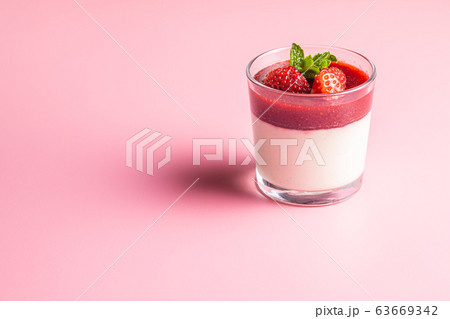 Italian dessert panna cotta with strawberries 63669342
