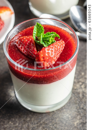 Italian dessert panna cotta with strawberries 63669343
