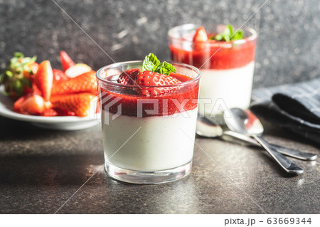 Italian dessert panna cotta with strawberries 63669344