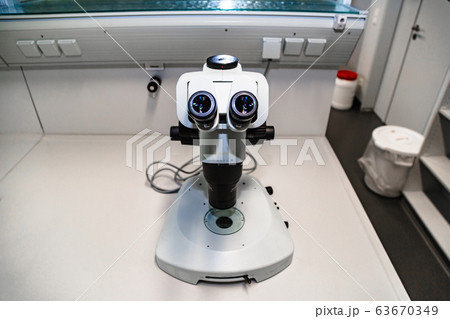 Laboratory microscope isolated on white close up Laboratory microscope isolated on white close up 63670349