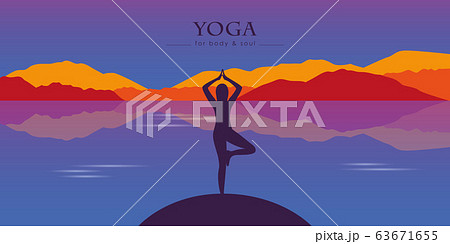 girl makes yoga at beautiful lake and mountain autumn landscape 63671655