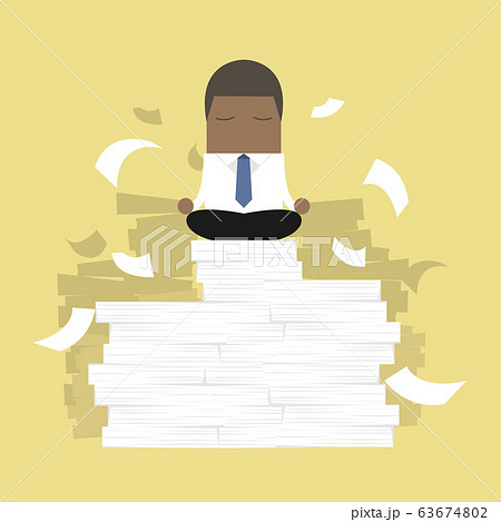 African businessman meditating in peace. 63674802