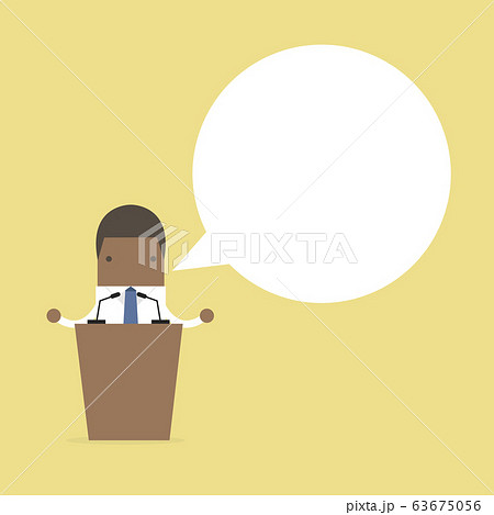 African businessman standing on podium and giving a speech. African businessman standing on podium and giving a speech. 63675056