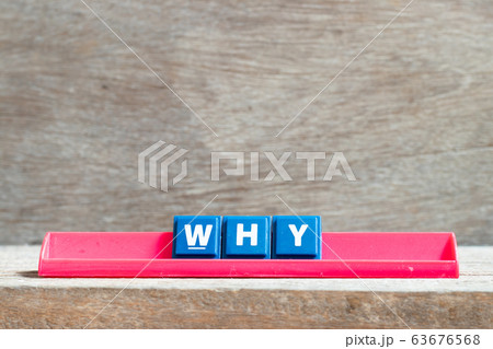 Tile letter on red rack in word why on wood background Tile letter on red rack in word why on wood background 63676568