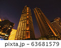 Blurred of skyscraper in the evening time. 63681579