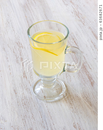 Antiviral drink with lemon, honey and ginger root 63682671