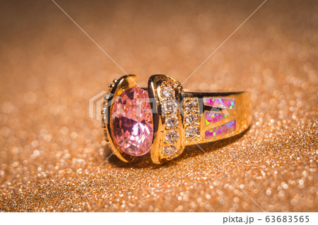 Golden ring with pink zircon 63683565