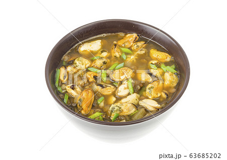 Hot spicy soup with mussels and vegetables 63685202