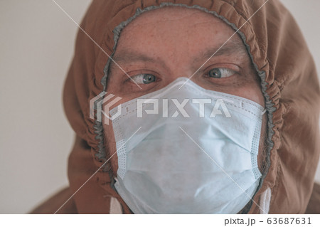 Man in a protective mask.  63687631