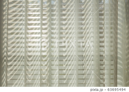 morning sunlight through curtain in room morning sunlight through curtain in room 63695494